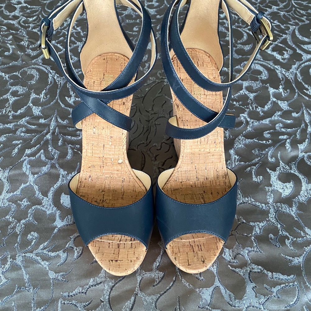 A stunning, deep Navy Blue!  Never Worn high wedge